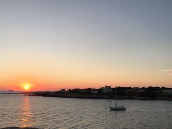 Scenic view of sea at sunset