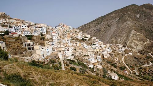 High angle view of olympos village by mountains