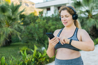 Young woman using mobile phone