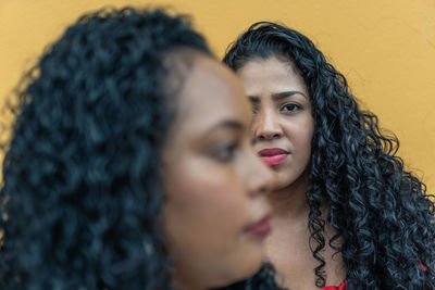 Close-up of young woman looking away