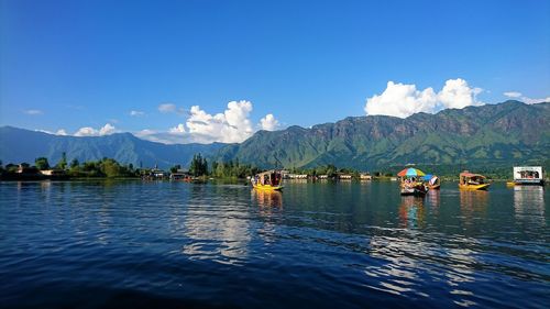 Scenic view of lake against blue sky