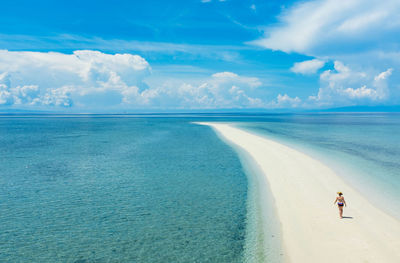 Scenic view of sea against cloudy sky