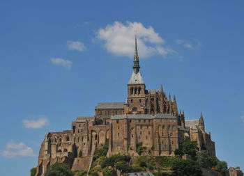 Low angle view of historic building against sky