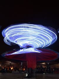 Blurred motion of people at night