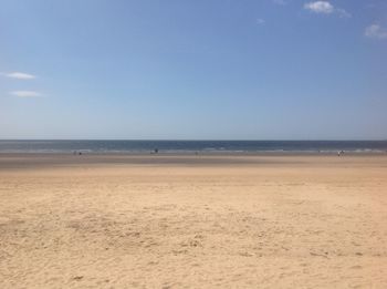 Scenic view of beach against clear sky