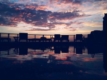 Scenic view of dramatic sky over sea during sunset