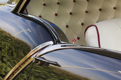 Cropped image of vintage car with reflection