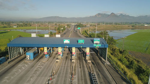 Highway with a toll payment point. aerial view of cars passing through the point of toll highway