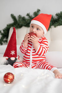 Cute baby girl playing at home