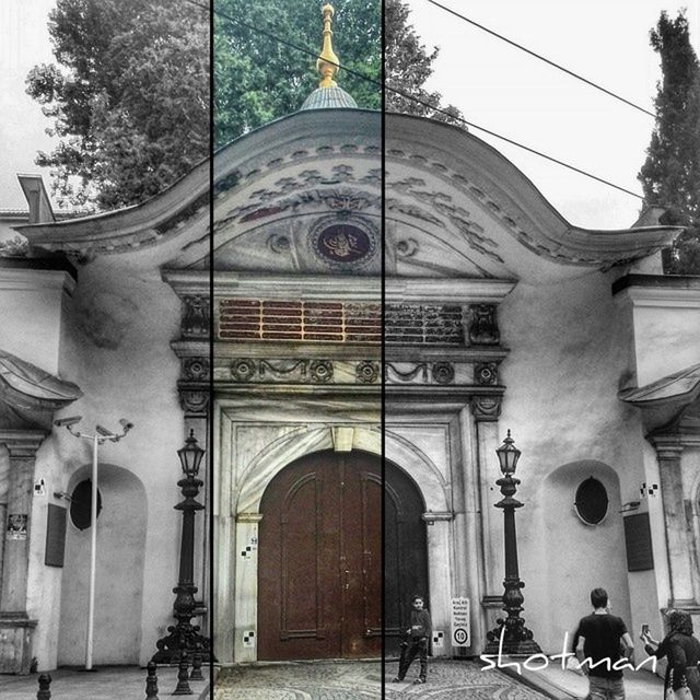 architecture, built structure, building exterior, entrance, arch, place of worship, religion, tree, facade, low angle view, spirituality, ornate, day, old, door, outdoors, church, art and craft, history, gate