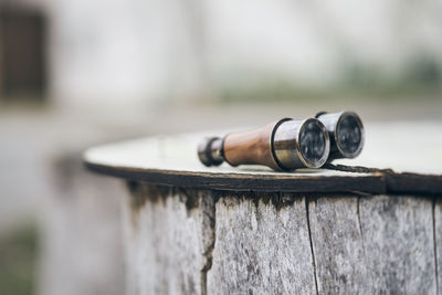 Close-up of rusty metal against wall