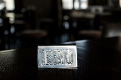 Close-up of text on table