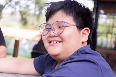 Close-up portrait of smiling boy