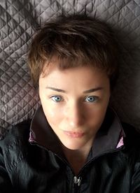 Close-up portrait of woman at home