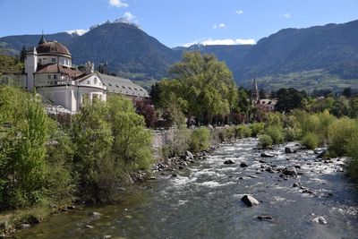 View of river with buildings in background