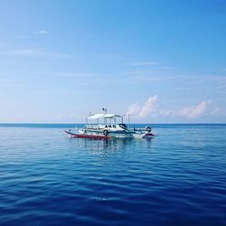 Boats in calm sea