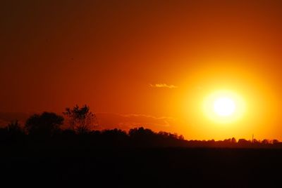 Scenic view of silhouette landscape against romantic sky at sunset