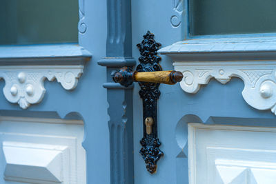 Close-up of door knocker on building