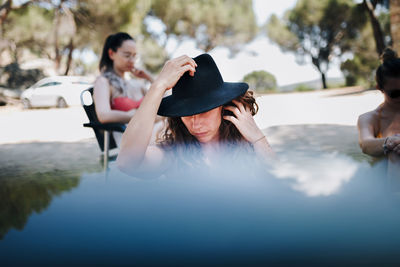 Woman looking away in water