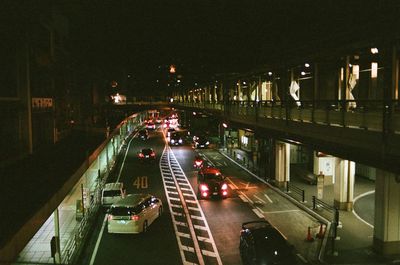 High angle view of cars on road at night