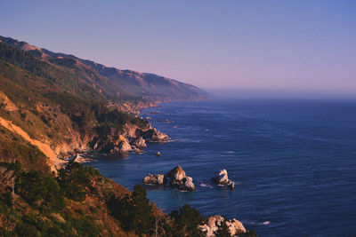 High angle view of sea against sky during sunset