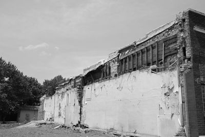 Abandoned building against sky