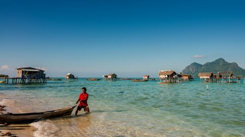 Panoramic view of sea against clear sky