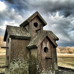 Exterior of church against cloudy sky