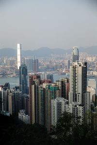 Modern buildings in city against sky