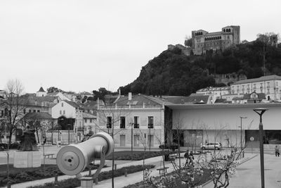 View of buildings in city against sky