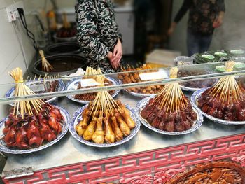 Close-up of man preparing food