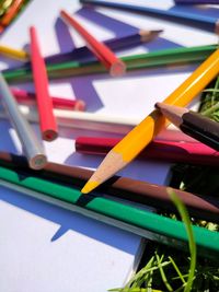 High angle view of colored pencils on table