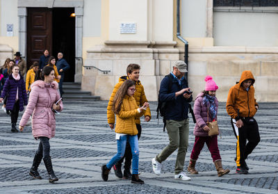 People walking on street in winter