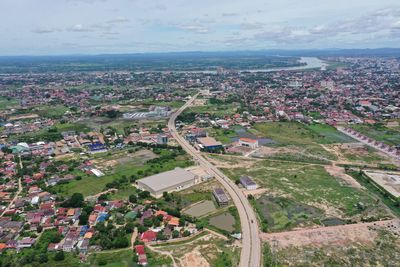 High angle view of buildings in city against sky