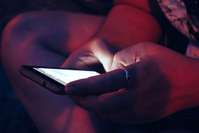 Close-up of woman using mobile phone