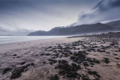 Scenic view of beach against sky