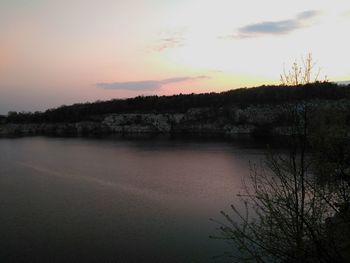 Scenic view of lake at sunset