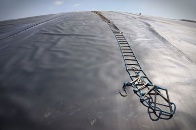 Low angle view of rope ladder on large tent