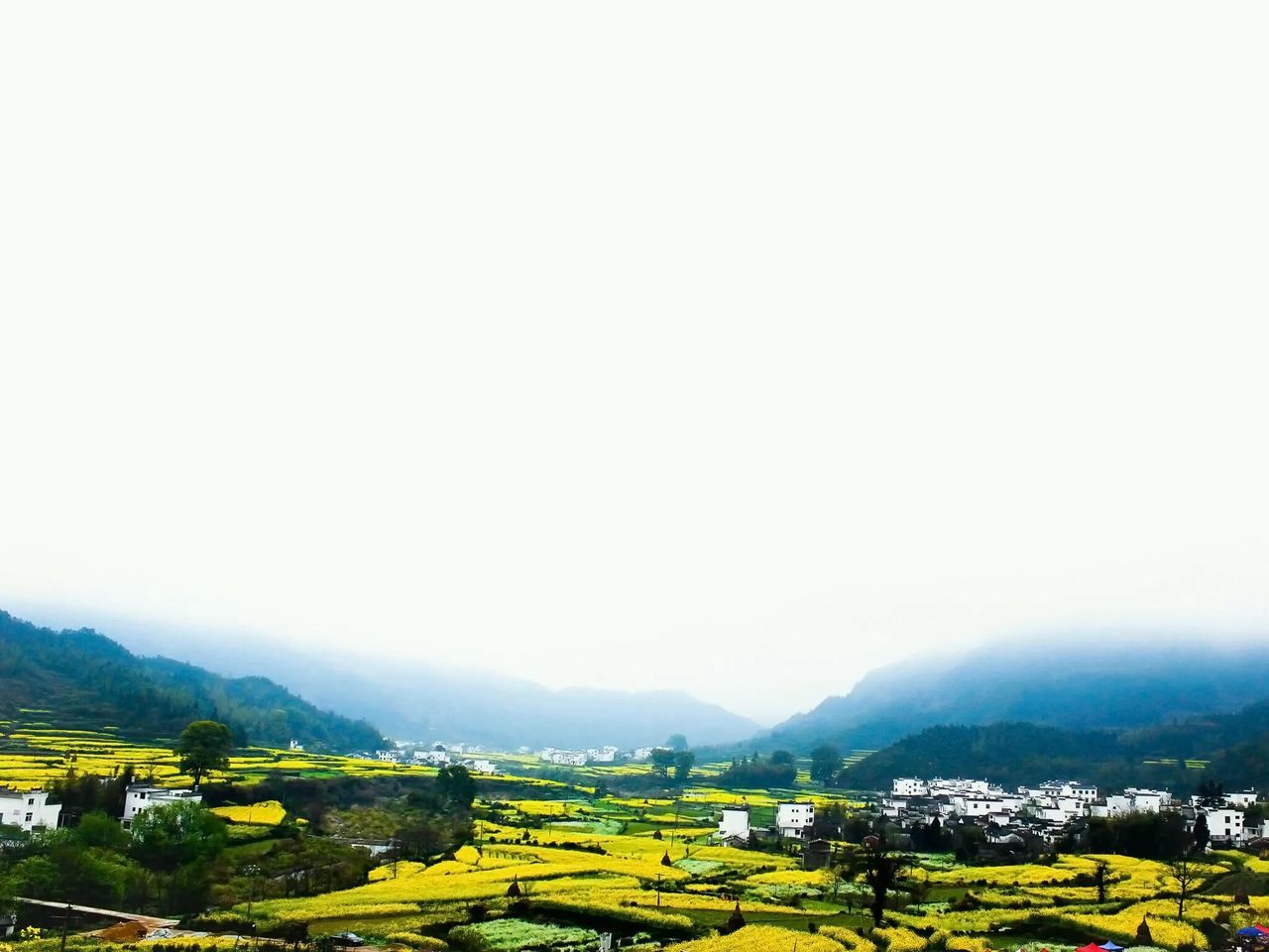 mountain, landscape, beauty in nature, scenics, tranquil scene, nature, mountain range, tranquility, growth, copy space, field, building exterior, built structure, clear sky, yellow, sky, agriculture, rural scene, house, architecture