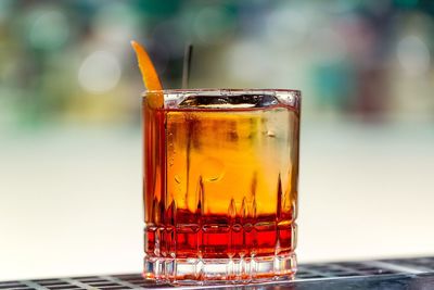 Close-up of beer glass on table