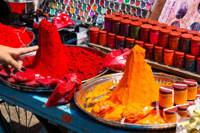 Midsection of multi colored vegetables for sale in market