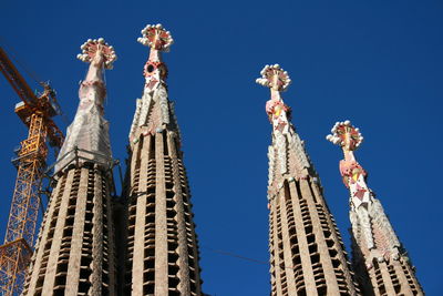 Low angle view of buildings against clear sky