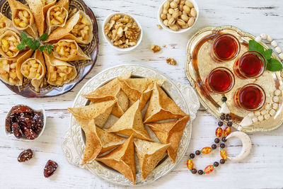 Ramadan kareem festive, fasting, halal food. ramadan menu assorted arabian pancake katayef 