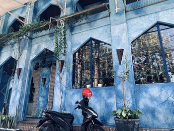 Bicycle against building in city