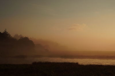 Tranquil view of lake at early morning