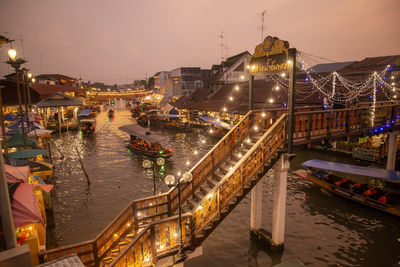 High angle view of illuminated buildings in city at night