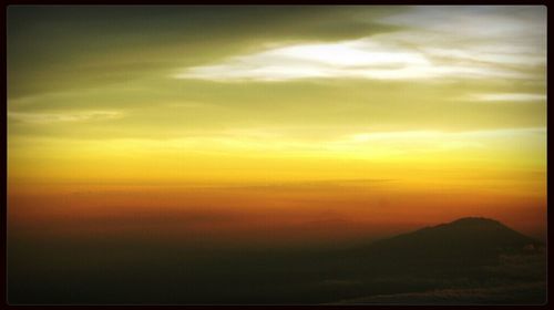Scenic view of landscape against sky during sunset