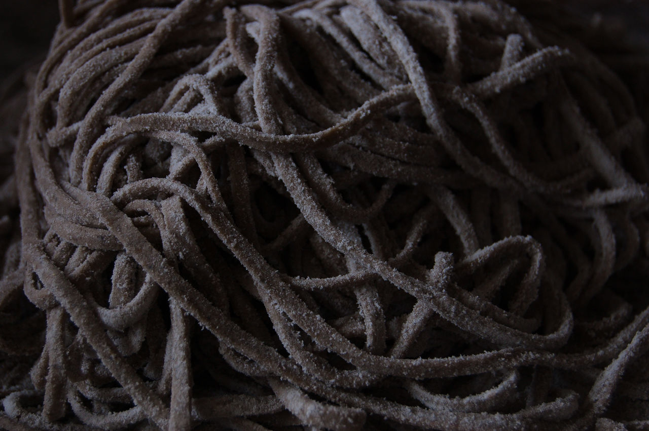 FULL FRAME SHOT OF ROPE TIED UP ON FABRIC