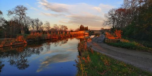 Scenic view of lake against sky during autumn