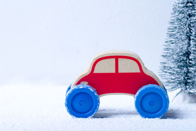 Close-up of toy car on snow